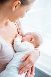 Mother breastfeeding baby.